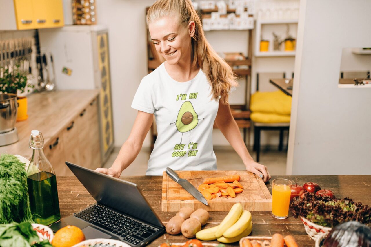 crew-neck-t-shirt-mockup-featuring-a-happy-woman-cooking-at-home-38310-r-el2